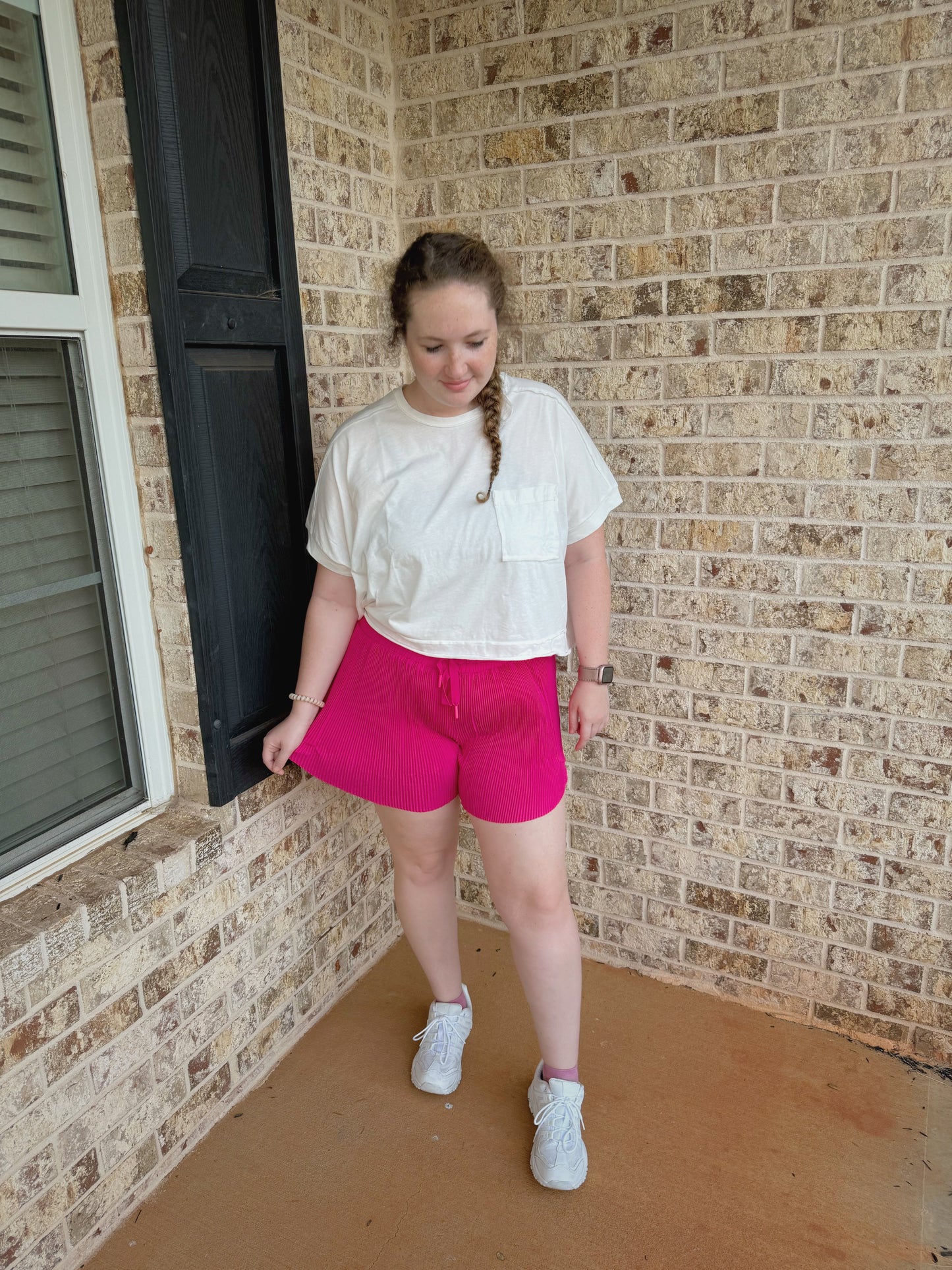 Pink pleated shorts