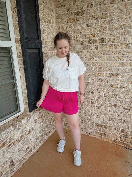 Pink pleated shorts